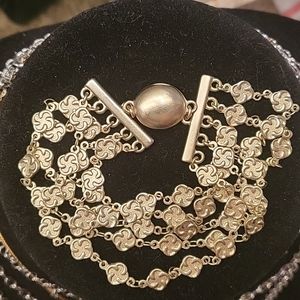 Chico's size 7 gold tone bracelet.